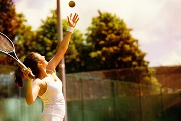 Foto op Aluminium Rear view of tennis player serving © vectorfusionart