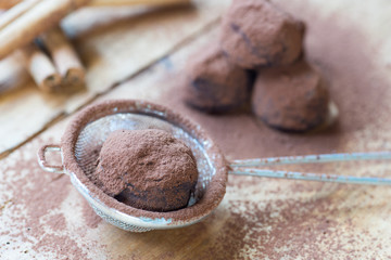 Dark chocolate truffles with cocoa powder