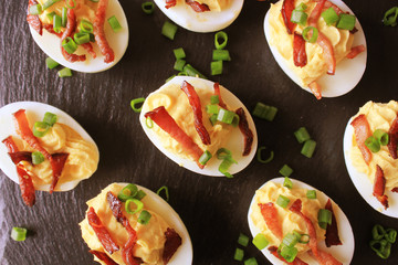 Bacon Deviled Eggs on black background