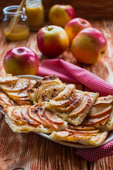 Pie: apple pie and apples on the wooden background