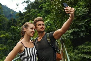 Take Photos. Couple Of Tourist People Making Selfie Photo With Mobile Phone On Summer Vacation....
