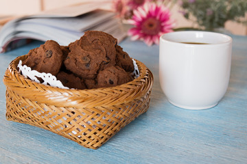 chocolate chip cookies on blue table background