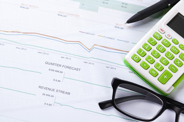 work with a magnifying glass, a calculator and papers