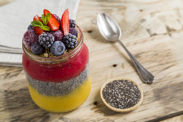 Chia pudding with granola and berry fruit