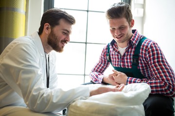 Fototapeta premium Brewers examining grains