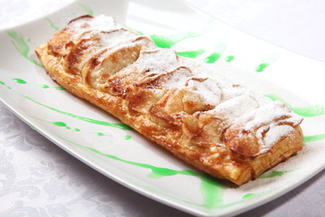 Pie on plate with Green Sauce