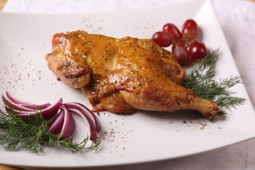 half chicken on platter