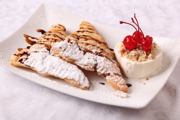 dessert with ice cream and a cherry