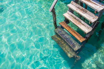Stair down to the clear water