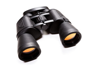 Black binoculars isolated over white background
