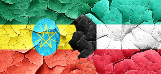 Ethiopia flag with Kuwait flag on a grunge cracked wall