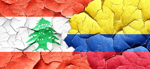Lebanon flag with Colombia flag on a grunge cracked wall