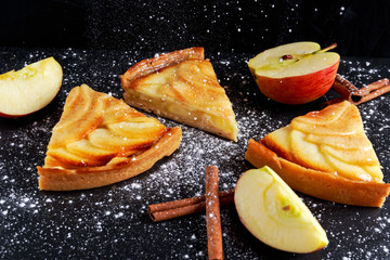 Slice of Golden Bramley apple tart with cinnamon glaze