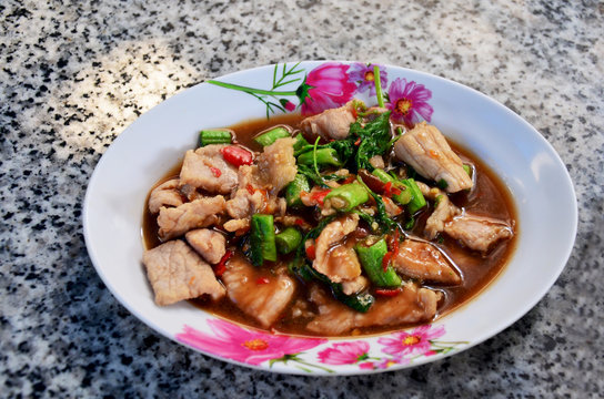 Thai food Stir-fried pork and basil with lentils