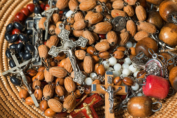 Many Rosary Beads with Crucifixes