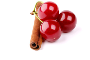 cherry and cinnamon isolated on white background