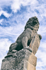 Fototapeta na wymiar Stone lion with shield, Úbeda, Spain