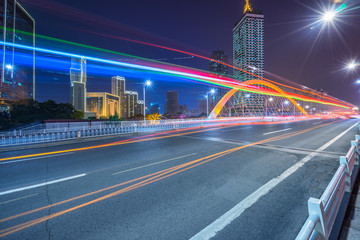 Fototapeta na wymiar motion blurred car at bridge,tianjin city,china.