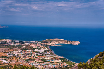 The city and the beach on the bay on the island of Rhodes.