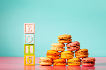 Stack of macarons with 2016 woodblock numbers