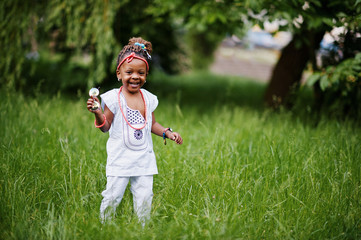 Amazing beautiful african american baby girl with sunglasses hav
