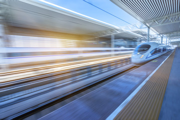 high-speed train at the railway station,motion blurred,tianjin china.