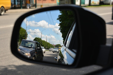 in the mirror of car