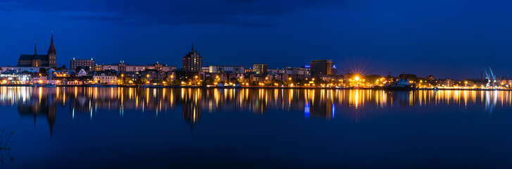 Fototapeta na wymiar Night Panorama view to Rostock. River Warnow and City port.