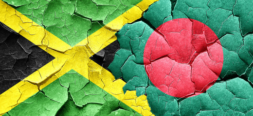 Jamaica flag with Bangladesh flag on a grunge cracked wall
