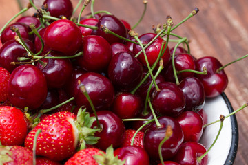 fresh sweet strawberry and cherry in the bowl