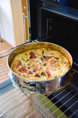 Homemade Spinach and Bacon Egg Quiche in a pie crust. French cuisine