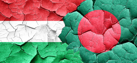 Hungary flag with Bangladesh flag on a grunge cracked wall