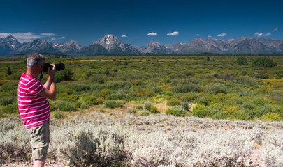 Fototapeta premium Photographer in Grand Teton National Park, Wyoming