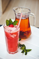 Fresh cold strawberry tea with ice and mint