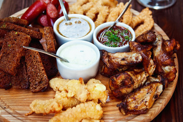 Beer platter - cheese sticks, rye croutons, chicken wings, home-smoked