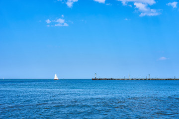 Pier at Nieuwpoort in Belgium / Sailing Ship at pier in North Sea