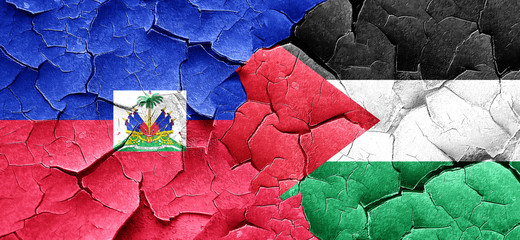 Haiti flag with Palestine flag on a grunge cracked wall