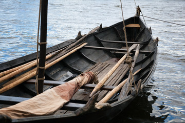 old Viking boat. old wooden boat with oars - 113477084