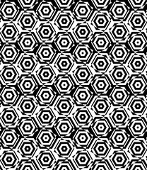 Black and white alternating small squares cut through hexagons