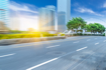 Obraz premium clean road with modern buildings background