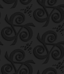 Black textured plastic spirals forming triangles with dots