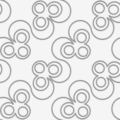 Perforated diagonal clover leaves on vine