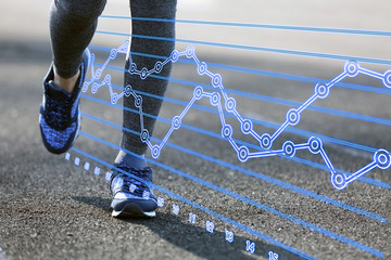 Running schedule concept. Sports woman legs in running movement