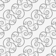 Perforated diagonal spiral flourish shapes