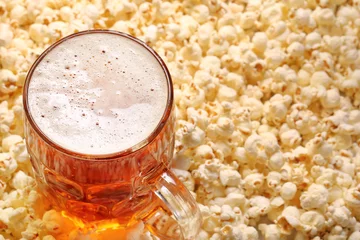 Foto auf Leinwand Pint of beer and popcorn with space for text © wideonet