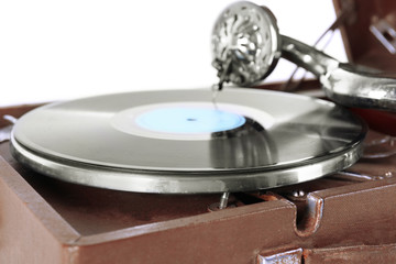 Old gramophone isolated on white