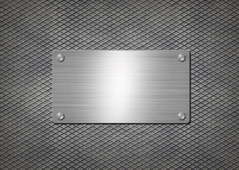 shiny metal plate on gray background