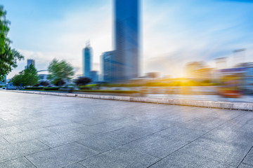 empty tiled floor and urban skyline,tianjin china.