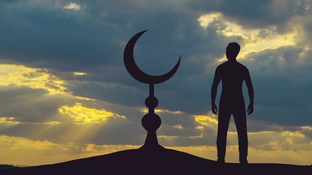 6 in 1! The man stand near the Islam symbol against the background of sunset. Time lapse