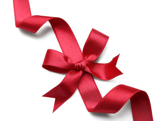 Red ribbon with bow on white background
